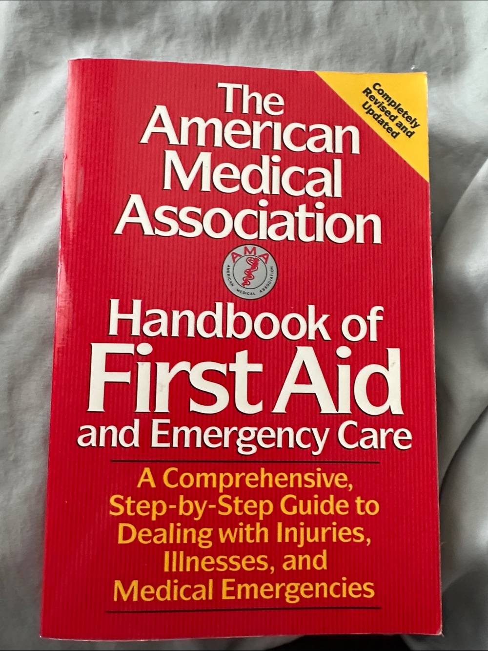 The American Medical Association Handbook of First Aid - Red Cover